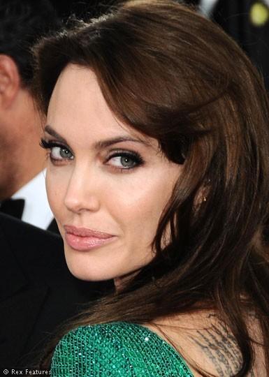 Angelina jolie with eye makeup, pink lips and slight blush
