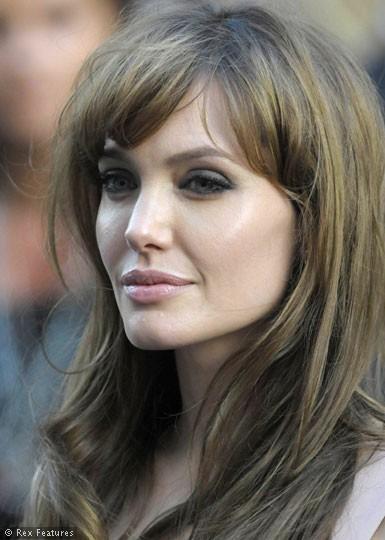 Angelina jolie with green eyes at the Salt Premiere
