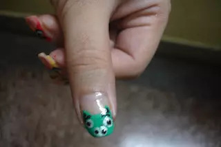 Nose and Eyes Nail Art