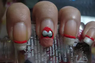 White and Black Eyes Nail Art