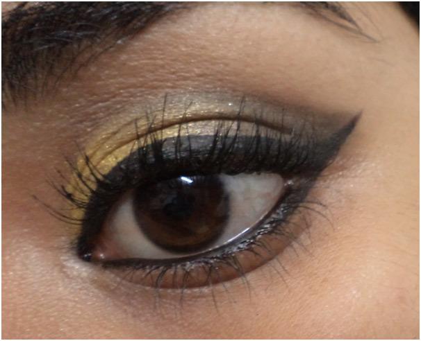 gold and black eye makeup 