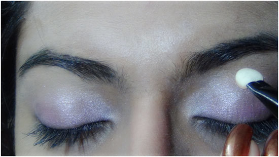 Apply the Shimmer mauve eye shadow