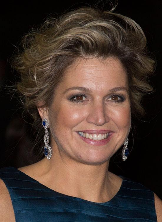 Very Short Hairstyles - Casual Rolled Back Waves Image: Getty