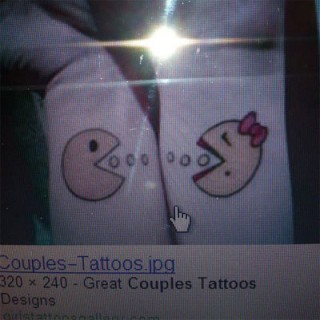 Cartoon couple tattoo