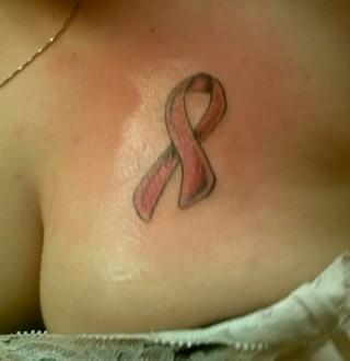 Red ribbon tattoo