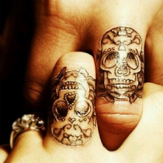 Skull couple tattoos