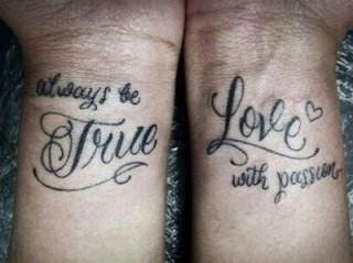 Slogan couple tattoos