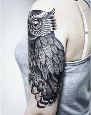 black and white owl tattoo