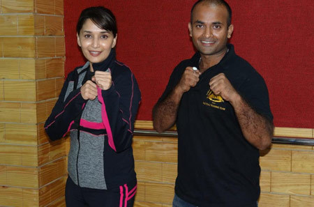Madhuri with her personal trainer