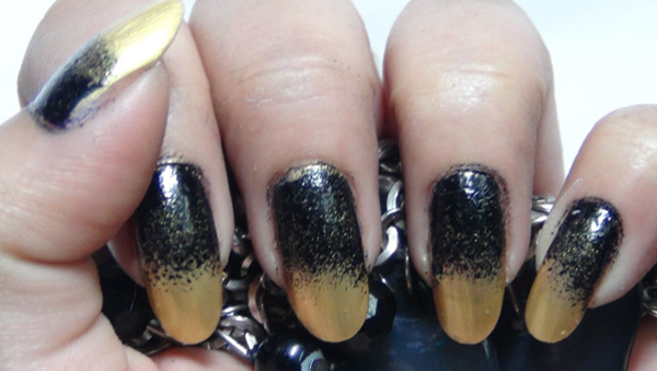 black and golden ombre nails four