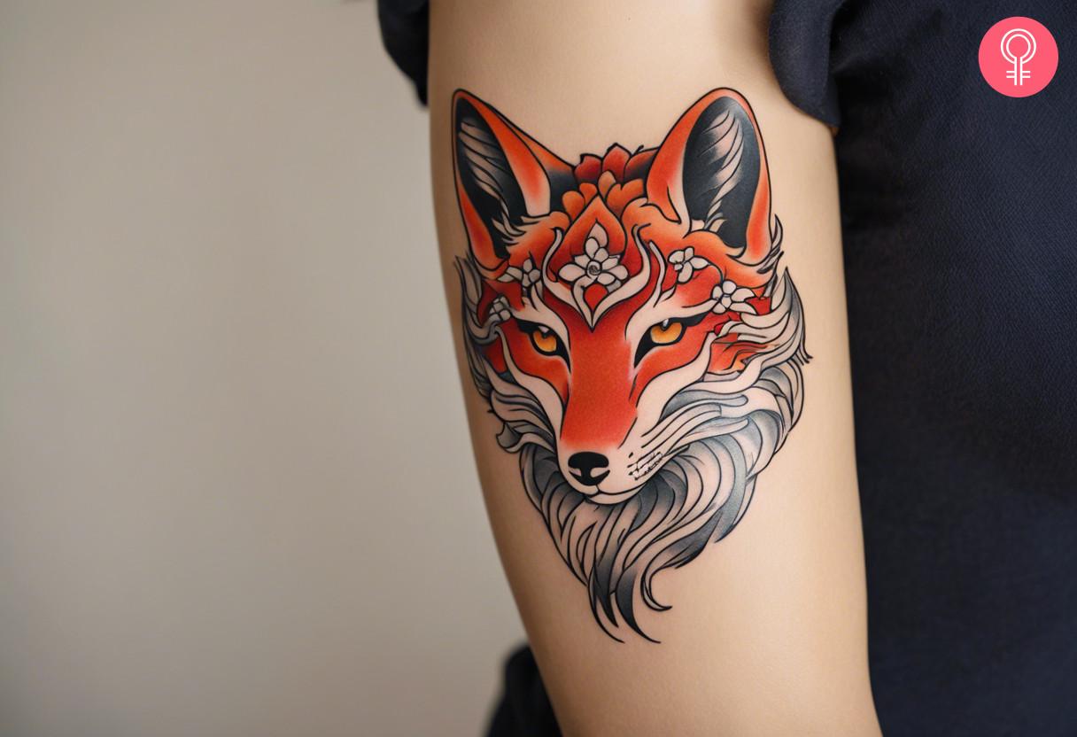 An oriental-themed tattoo on the upper arm