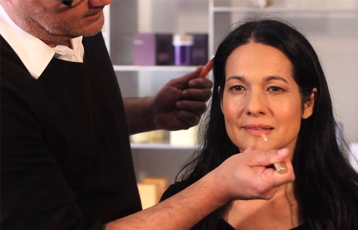 Step 5 of makeup for women over 40 is to apply lip gloss