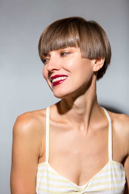 Thick fine blunt fringe hairstyle to flaunt your hair's thickness