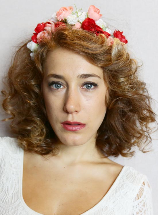 Layered wavy bob with flower headband for styling frizzy hair