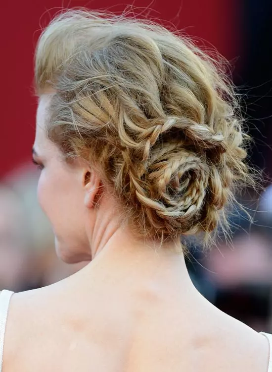 Messy braided rose bun with small pouf for styling frizzy hair