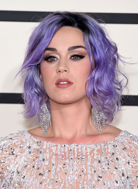 Katy Perry sporting a purple short fluffy messy hairstyle