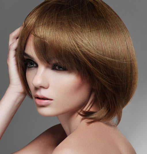 Round bob with bangs hairstyle for a square face