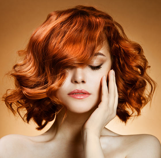 Fiery wispy curls hairstyle for a square face
