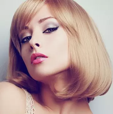 Long bob with bangs hairstyle for a square face
