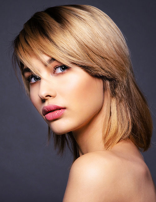 Blonde layers with a fringe hairstyle for a square face
