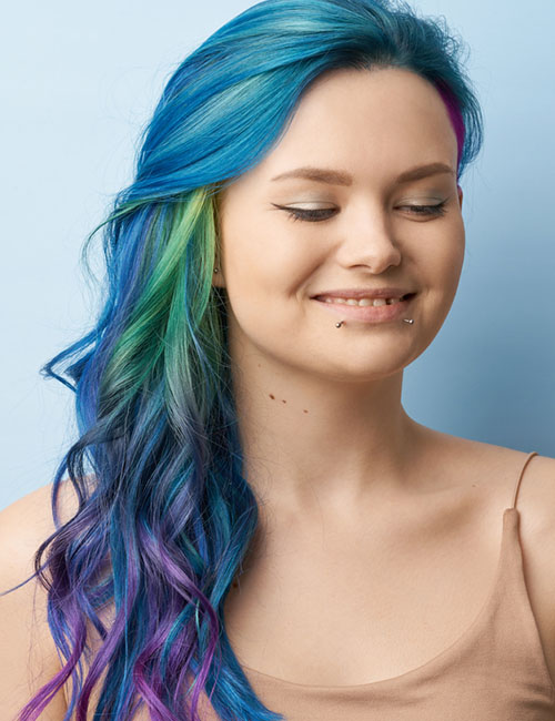 Wavy rainbow layered hairstyle for a square face