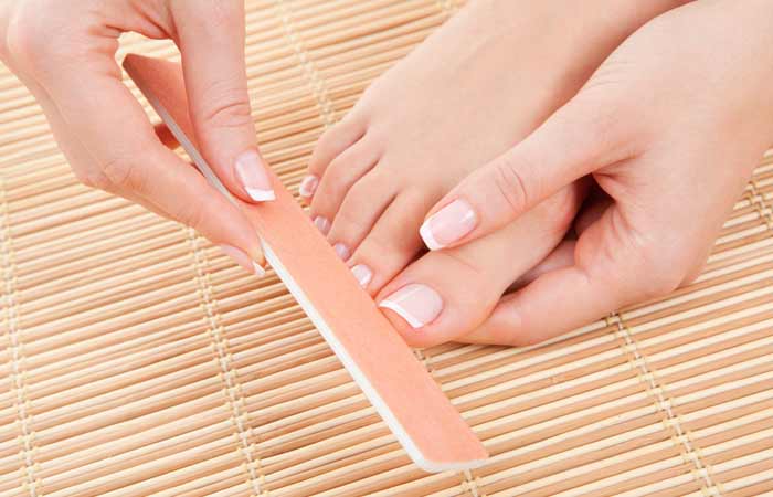 Make your feet soft by buffing toenails