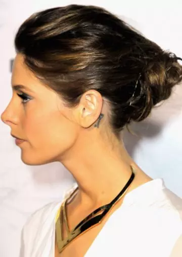 Semi-high angled bun hairstyle for professional women