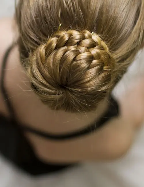 A beautiful braided bun on a girl