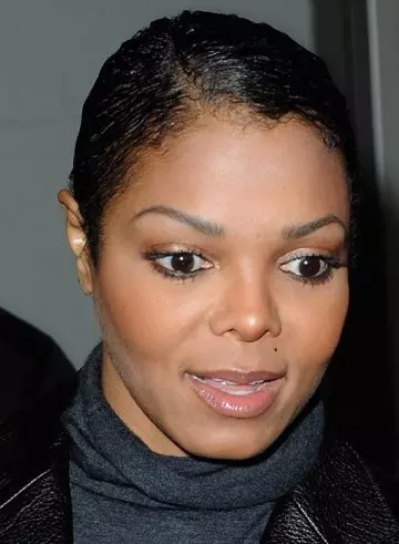 Janet Jackson's cropped and parted bold bald and beautiful hairstyle