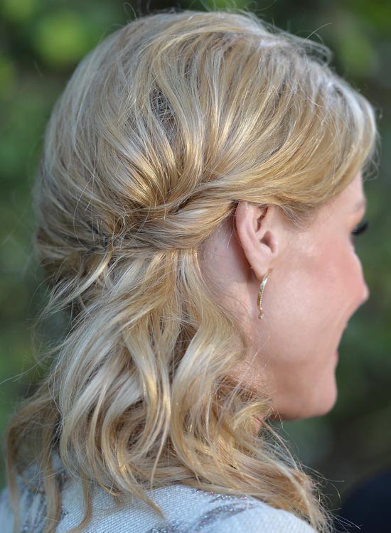 Loose messy waves with twisted side hairstyle for wedding season