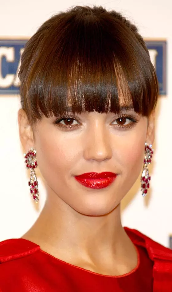 Blunt of bangs swept at the sides hairstyle for long faces