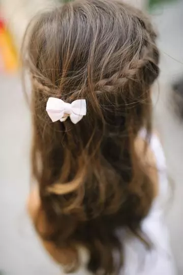 Micro braided half tie hairstyle for little girls