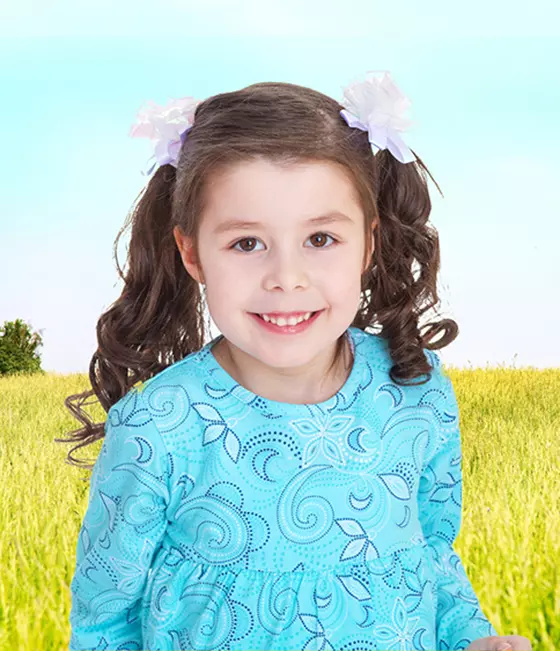 Curly pigtails with ribbons for little girls