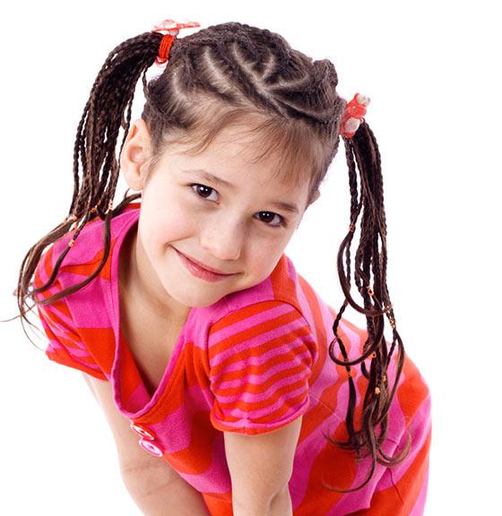 Swirling cornrow pigtails for little girls