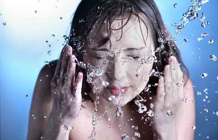 Remove Holi colors by washing face with cold water