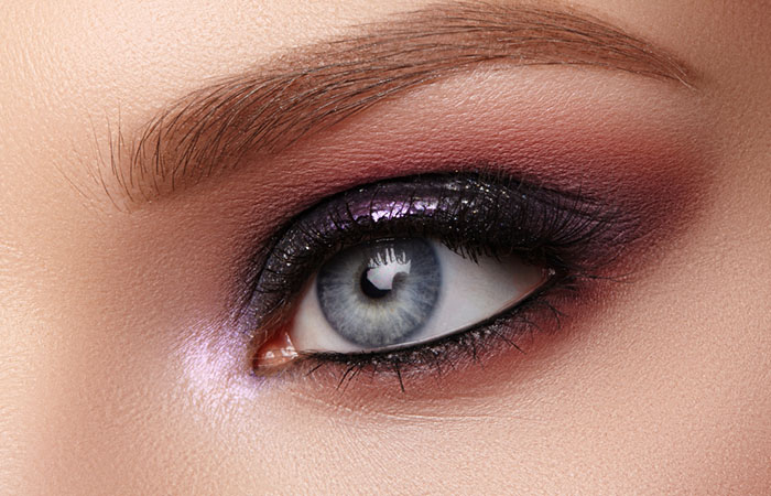 A female eye with shimmery eyeshadow makeup