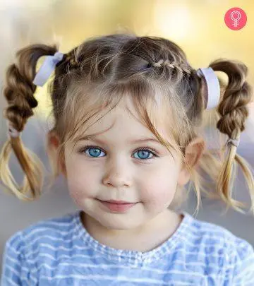 A little girl with a beautiful hairstyle