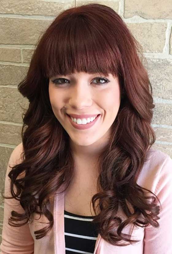 Super curly layers with super straight bangs layered hairstyle