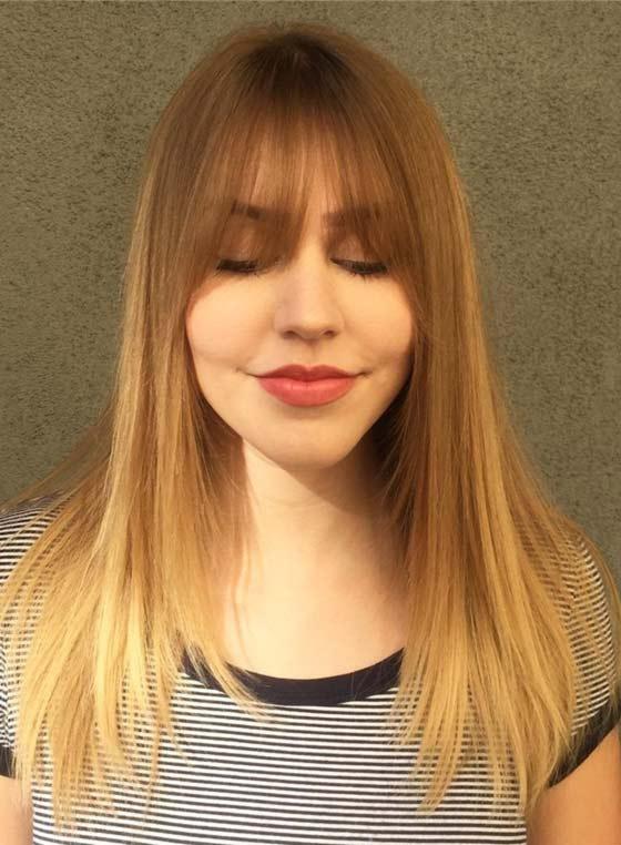 Straight ombre layers and eye grazing bangs layered hairstyle