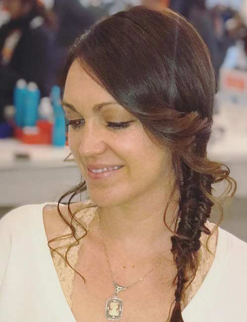 Fishtail braid hairstyle with curled bangs