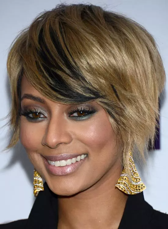 Golden blonde bob hair color with soft black lowlights