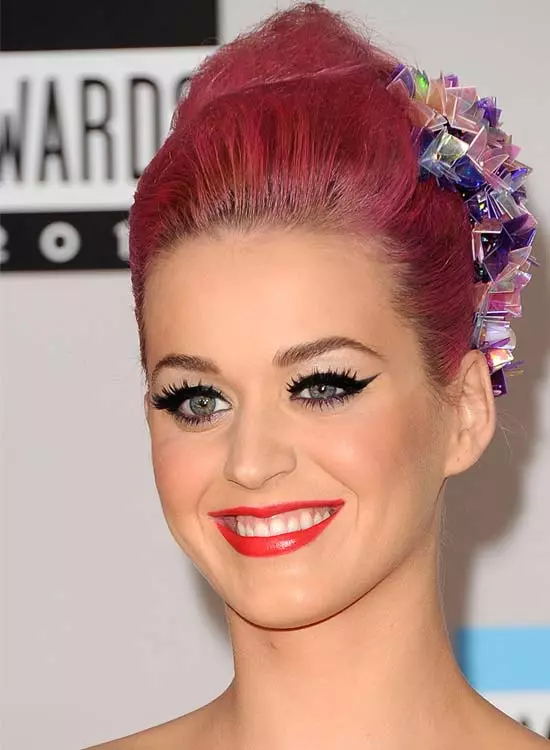 Ruby pink high bun hair color with accessories