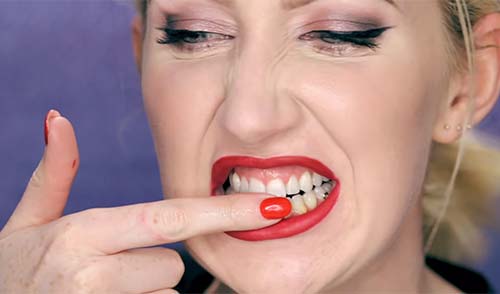 Check For Lipstick On Your Teeth - How To Wear Red Lipstick