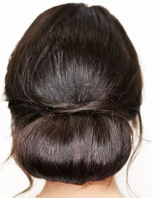 Vertical low bun for an Indian hairstyle