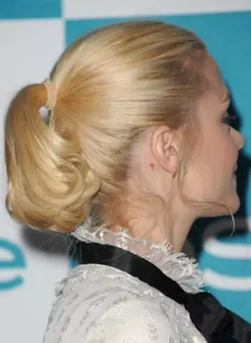 Blonde short high ponytail with tender bangs edgy hairstyle for medium length hair