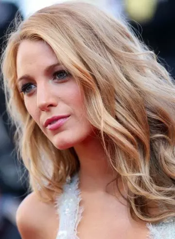Blonde subtly tousled waves edgy hairstyle for long hair