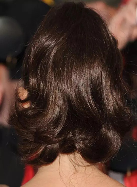 Brunette high shine ponytail edgy hairstyle for medium length hair