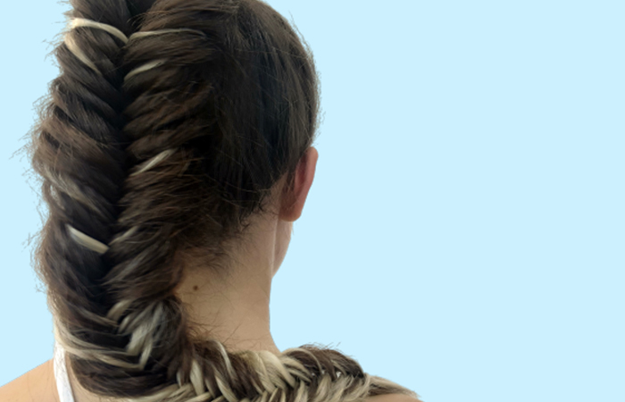 Fishtail pony braided hairstyle on brown hair