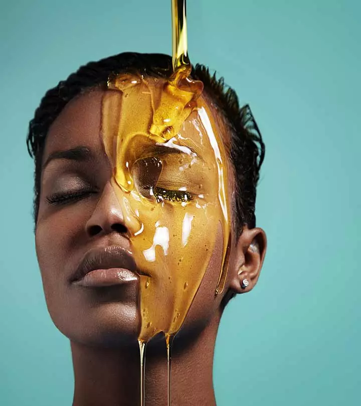 Honey For Oily Skin – 12 Best Ways To Use It Effectively A woman with glowing skin