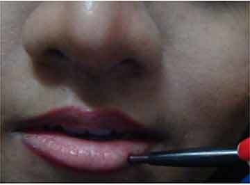 Application of lip liner for Bhartanyatam makeup